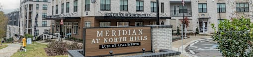 A large building with a sign that says Meridian at North Hills.