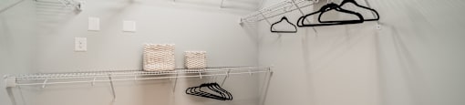 our spacious closets are stocked with shoes and bags in our spacious walk in closet