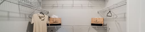 our spacious walk in closets are equipped with shelves and baskets for clothes and shoes