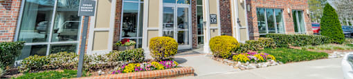 a photo of the front of the meridian at sutton square apartment building