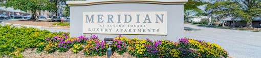 an image of the meridian sign in front of the building