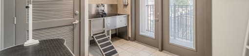 a wet room with a shower and a sink