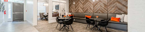 the preserve at ballantyne commons clubhouse with tables and chairs