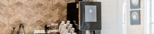 a coffee machine sitting on a counter in a room