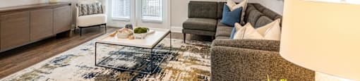 a living room with a couch and a coffee table