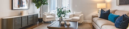 a living room with a couch and a coffee table