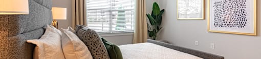 the preserve at ballantyne commons bedroom with large bed and window