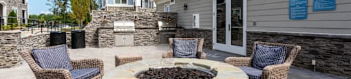 the preserve at ballantyne commons patio with fire pit and chairs