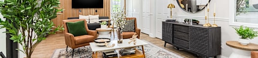 a living room with a couch and a table