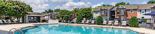 the preserve at ballantyne commons pool and spa with apartment buildings