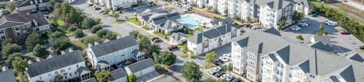 an aerial view of apartment buildings in a neighborhood