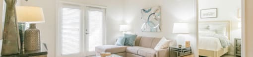 a living room with a couch and a table