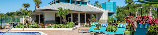 a house with a pool in front of it