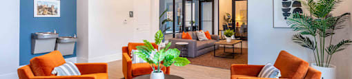 a living room with couches and a coffee table