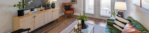 living room with white walls and two french patio doors