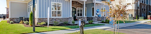the exterior of a building with a parking meter in front of it