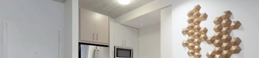 1 bedroom apartments have kitchens with a bar