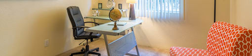 The Springs bedroom with carpet flooring and nice natural lighting