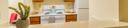 Enclave spacious kitchen with breakfast bar and seating