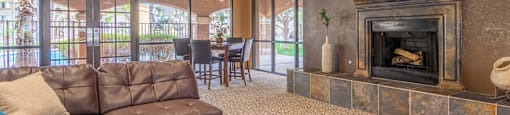 Catalina Canyon clubhouse, view of seating area and fireplace.