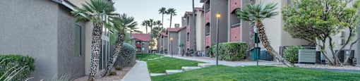 Enclave courtyard view with lush landscape