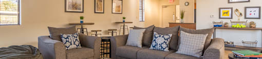 Villas at Montebella clubhouse with cozy couches and nice carpet flooring