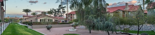 Enclave courtyard view with lush landscape