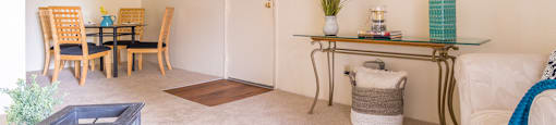 Catalina Canyon dining area with ceiling fan near the front door.