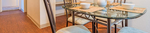 Somerpointe dining area with nice lighting and wood flooring