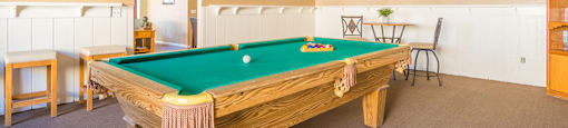 Riverstone clubhouse with pool table and lounging area