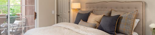 La reserve bedroom with ceiling fan and nice natural lighting