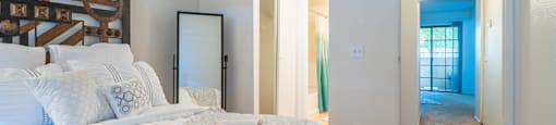 El Encanto Spacious master bedroom with bathroom and carpet