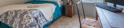 Somerpointe spacious bedroom with carpet flooring and nice natural lighting