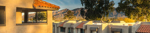 Riverstone outside view of apartments with nice tall trees surrounding