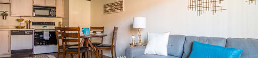 Villas at Montebella living room with nice natural lighting and carpet flooring