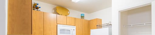 Desert Sands kitchen with all white appliances.
