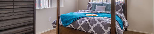 Cantera spacious master bedroom with nice natural lighting