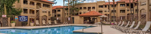Foothills view of pool with nice lush landscape surrounding