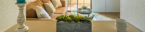 El Encanto spacious living room with sliding glass doors and plenty of natural light and private balconies