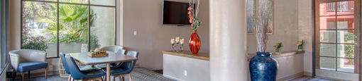 Ridgepointe clubhouse with wood flooring and sliding glass doors