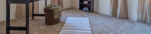Canyon creek spacious bedroom with nice natural lighting and carpet flooring