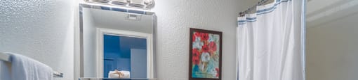 El Encanto nice bathroom with shower tub combo