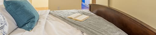 The Springs bedroom with carpet flooring and spacious closet