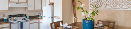 Cantera spacious kitchen with nice dining space