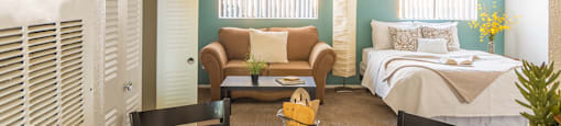 El Encanto studios with spacious rooms and cozy couches
