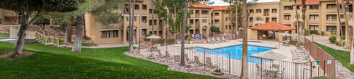 Foothills view of pool with nice lush landscape surrounding