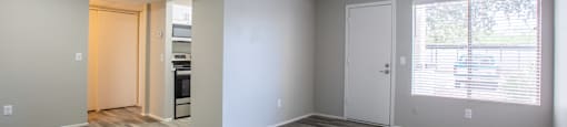 A room with a grey floor and white walls.
