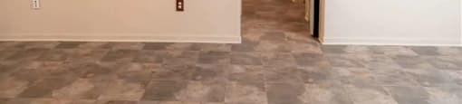 Living room to hallway at Hallmark at Garden Parkway