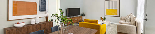 a living room and dining room with a wooden table at The Junction, Memphis, TN, 38111