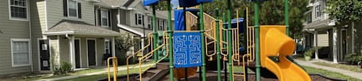 Outdoor green space with playground